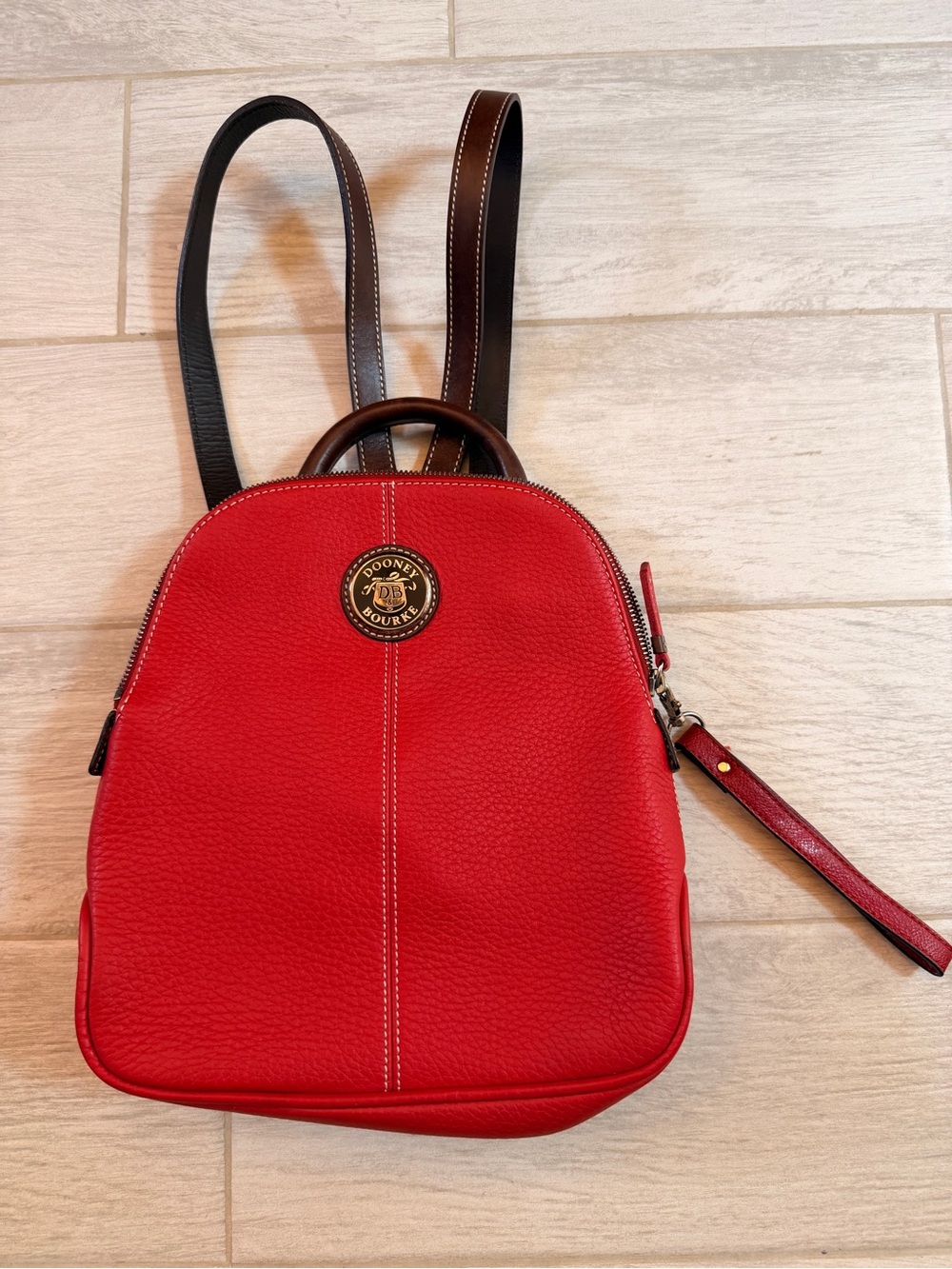 Dooney & Bourke Red Pebble Leather Mini Backpack with Gold Accent